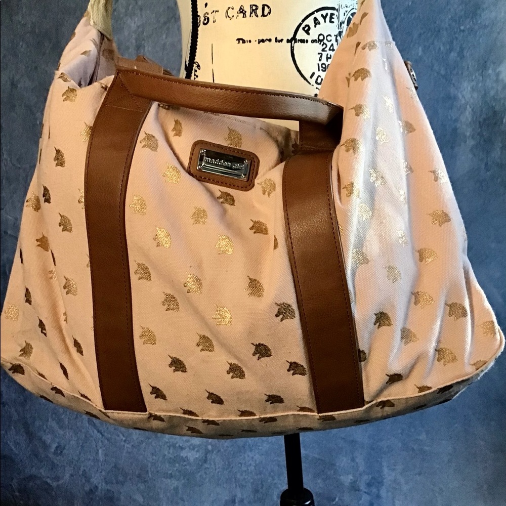 Madden Girl Weekender. Blush pink with subtle gold unicorn head motifs.